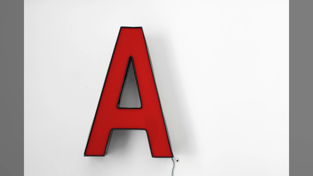 AIRapGenerator: one bold letter, the start of a name built from your words